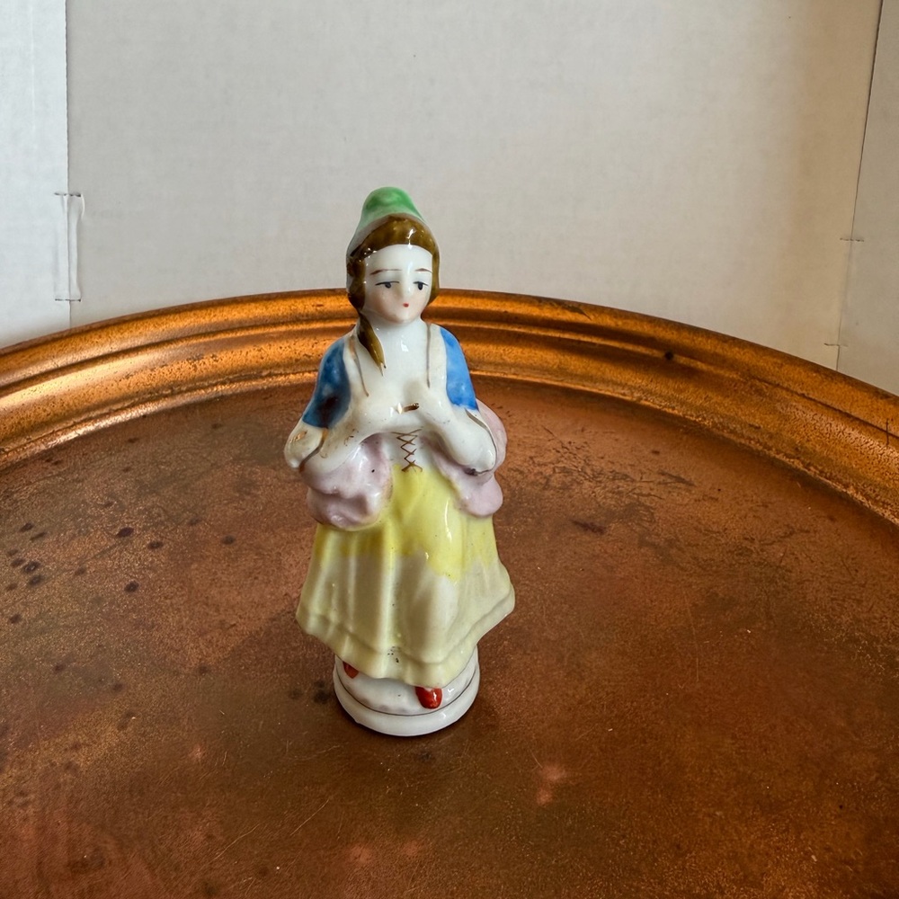 Hand-Painted Porcelain Figurine in Pastel Colors